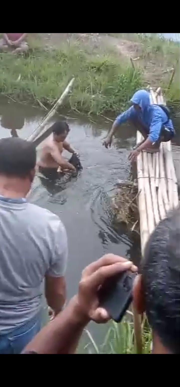 Geger! Warga Desa Semuli Raya di Kaget kan Penemuan sesosok Mayat Bayi Tersangkut di Aliran Irigasi