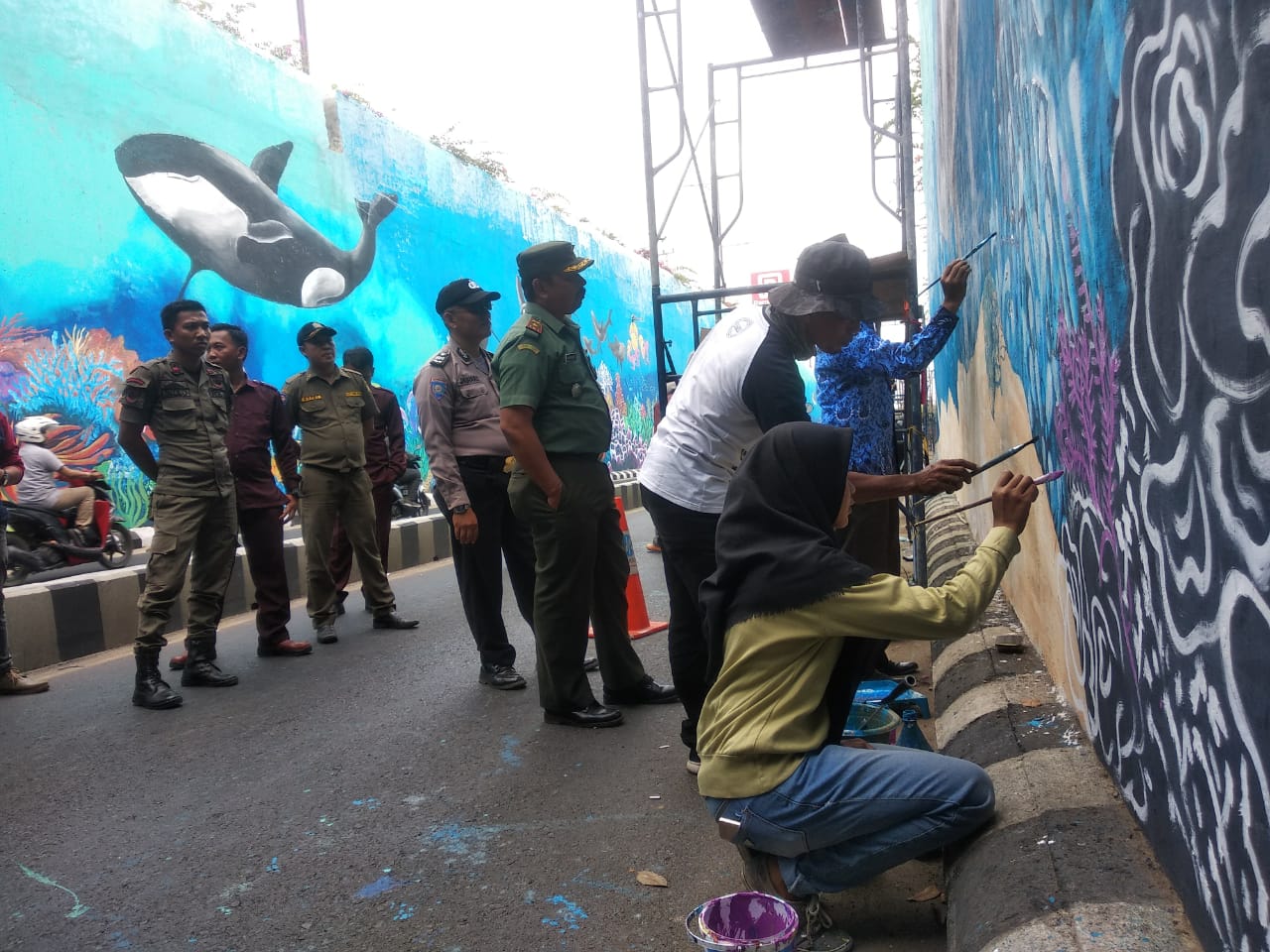 10 Personel TNI Jaga Pekerja Mural Underpass Unila