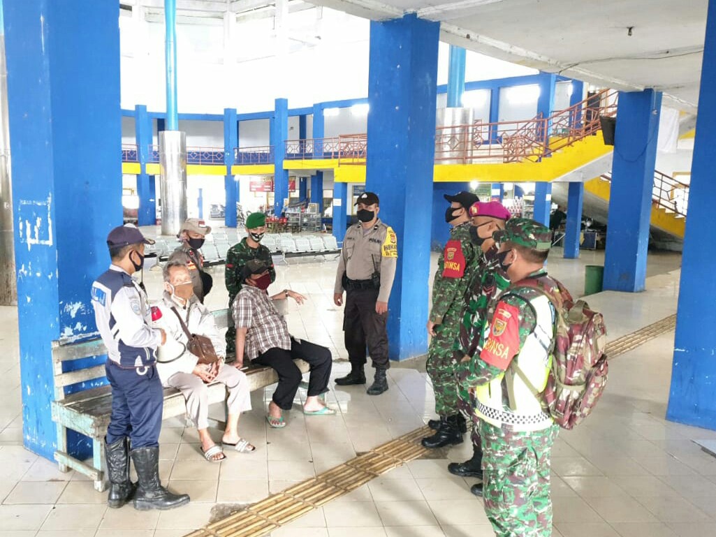 Kodim 0410/KBL Bersama Gugus Tugas Covid19 Kota Bandarlampung Laksanakan pengamanan di Pos PAM  Terminal Induk