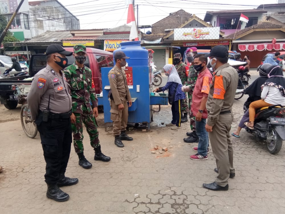 Penanganan Protokol Kesehatan oleh Kodim 0410/KBL kepada Masyarakat