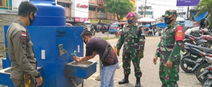 Kodim 0410/KBL dan Gugus Tugas Laksanakan Tertib Prokes di Pasar