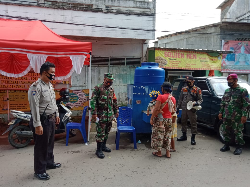 Personel Kodim 0410/KBL Terus Lakukan Prokes di Pasar Tradisional