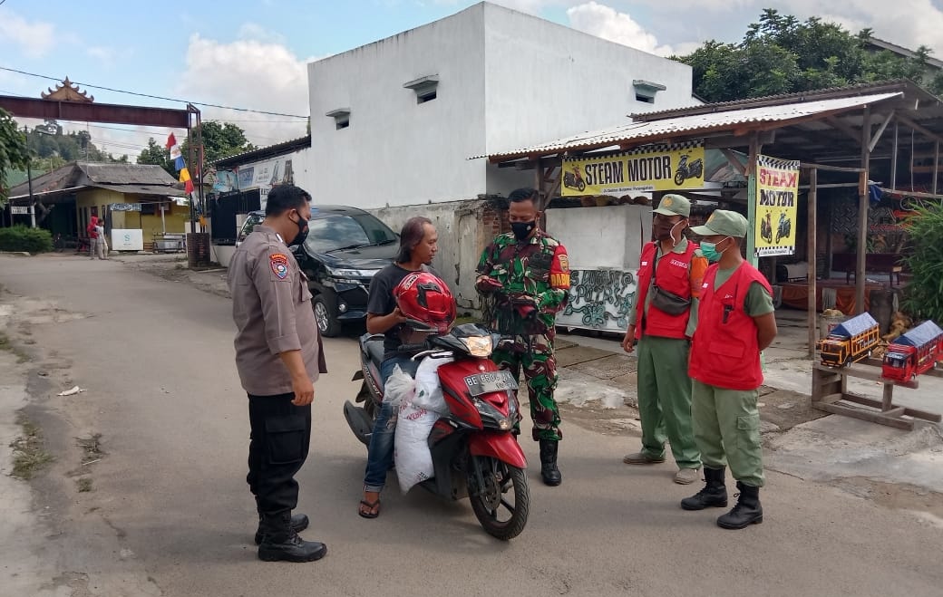 Personel Kodim 0410/KBL Lakukan Operasi Masker