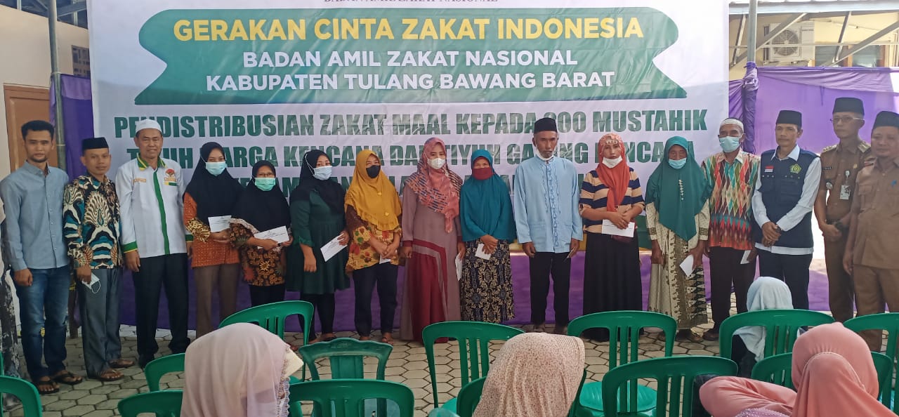 Baznas Tubaba Bagikan Zakat Fitrah dan Zakat Mal